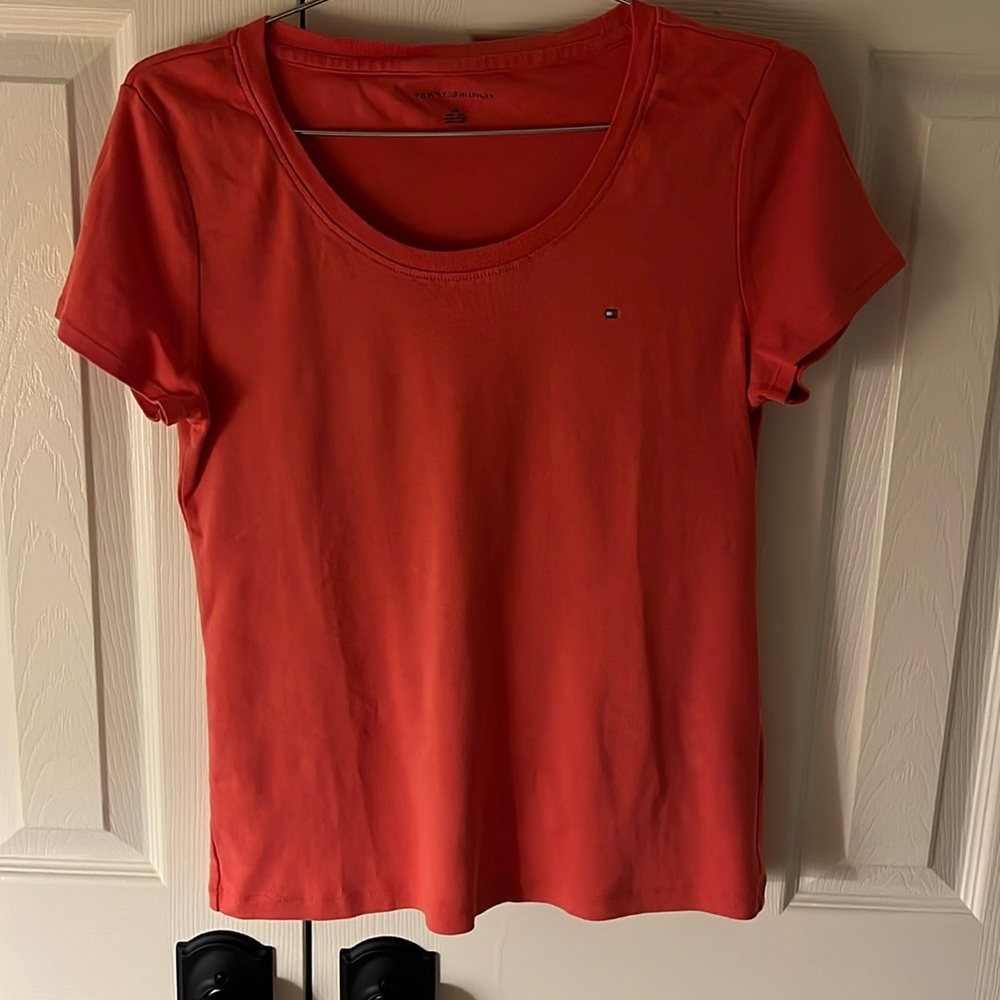 Tee shirt by Tommy Hilfiger. Size LRG (runs smaller). Gently used. Smoke free.